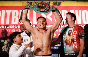 Pitbull scores sixth-round KO in messy fight